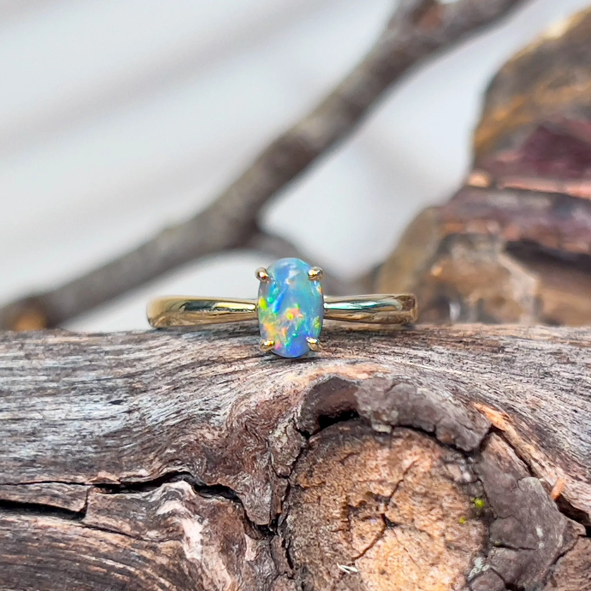 14kt Yellow Gold solitaire ring with one 0.49ct Black Opal